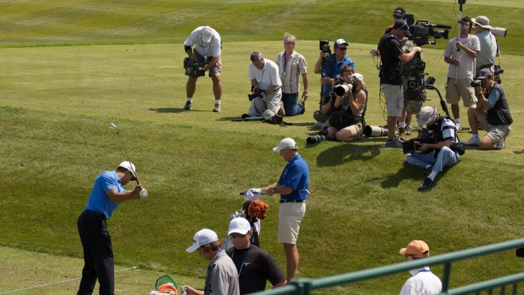 Media and Golfer on Golf Course