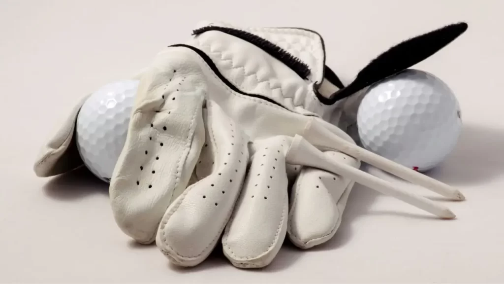 Golf gloves sitting on white table