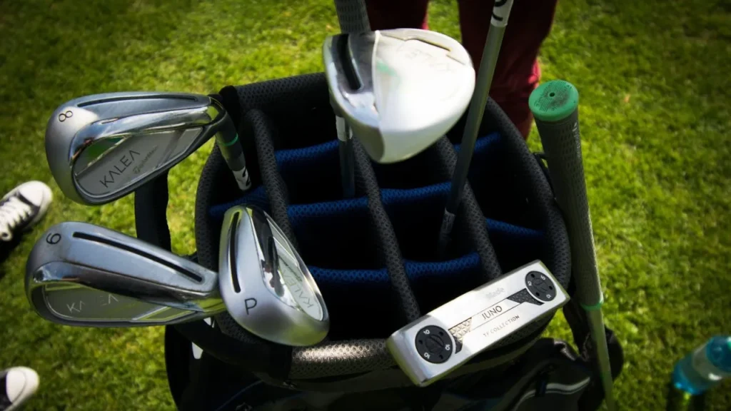 A top view of a golf bag with golf clubs